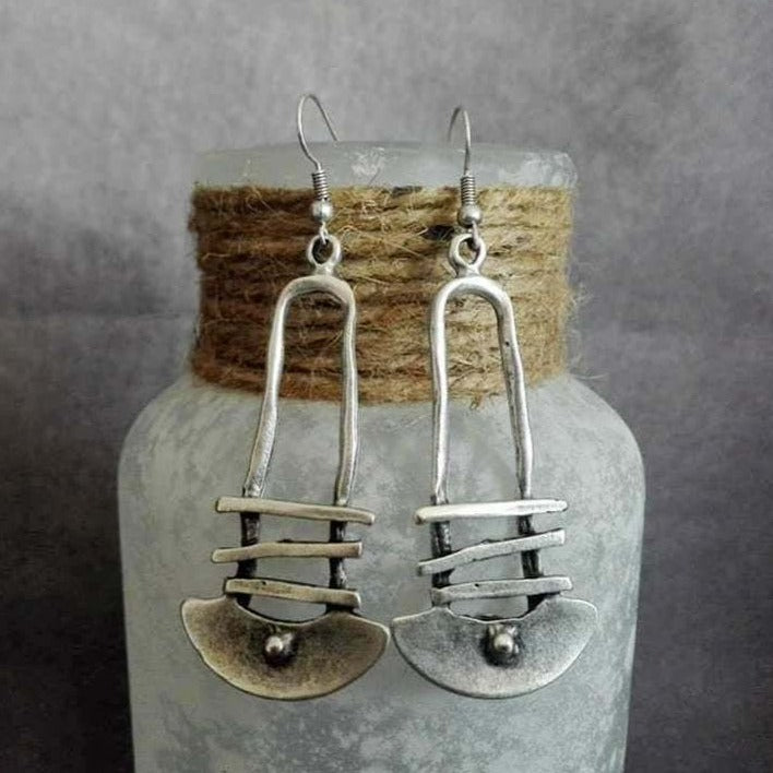 Boucles d'oreilles géométriques avec une forme spéciale