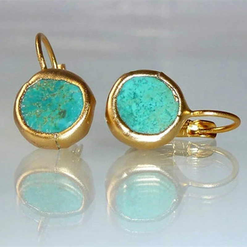 Boucles d'oreilles finition or avec pierre turquoise