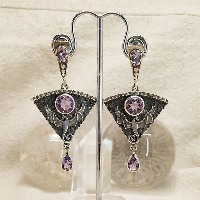 Boucles d'oreilles vintage en argent et zirconium violet