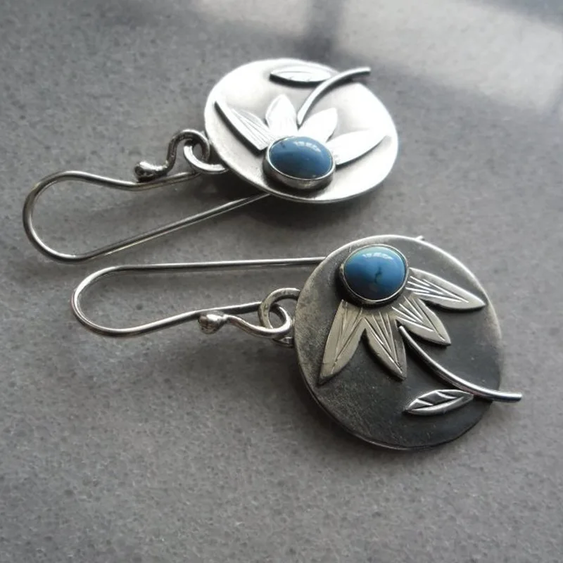 Boucles d'oreilles en argent vintage avec fleur et pierre bleue
