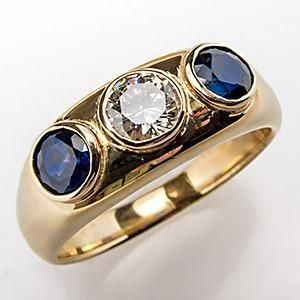 Bague vintage en or avec incrustation de verre bleu et zirconium