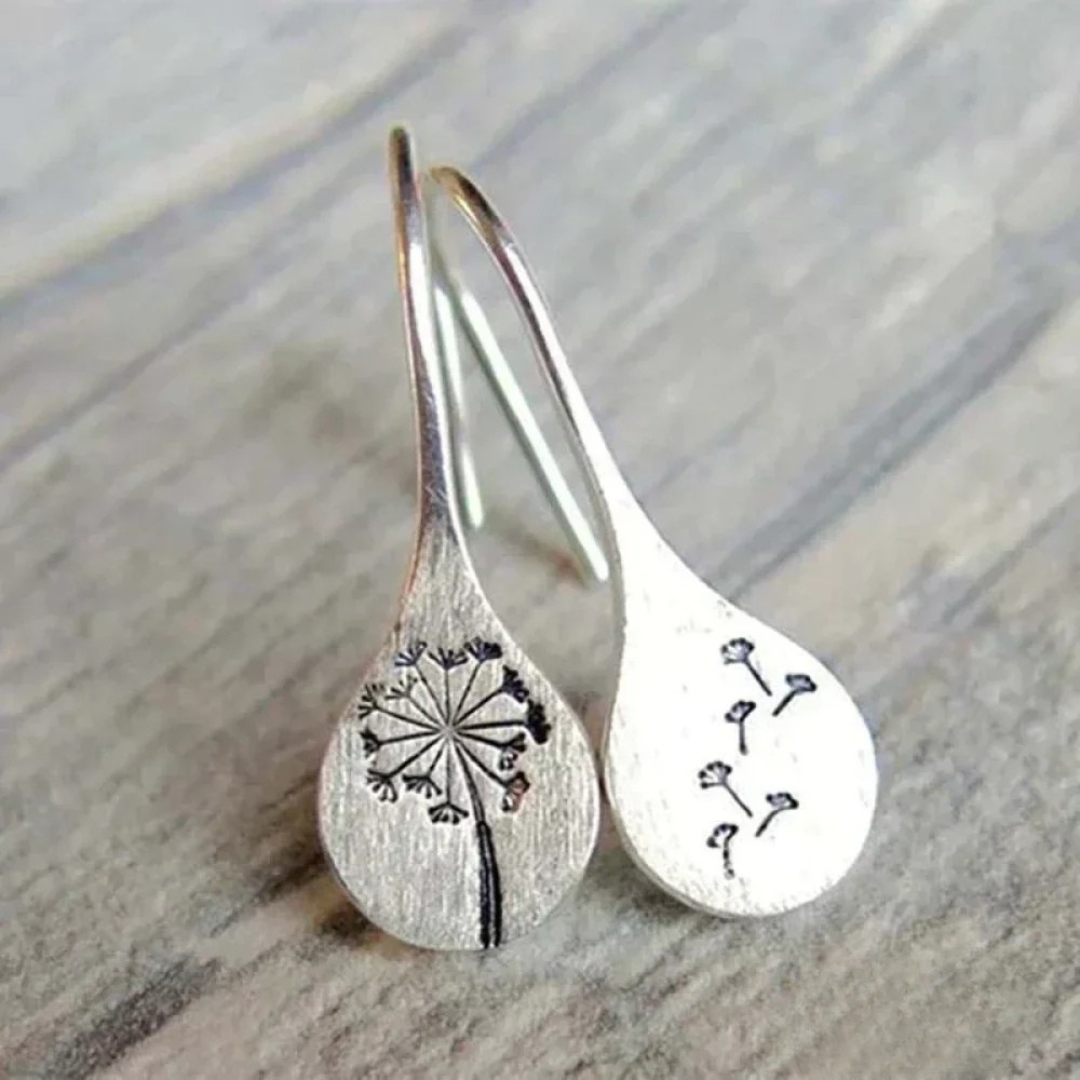 Boucles d'oreilles en argent finement travaillées en forme de feuille de pissenlit