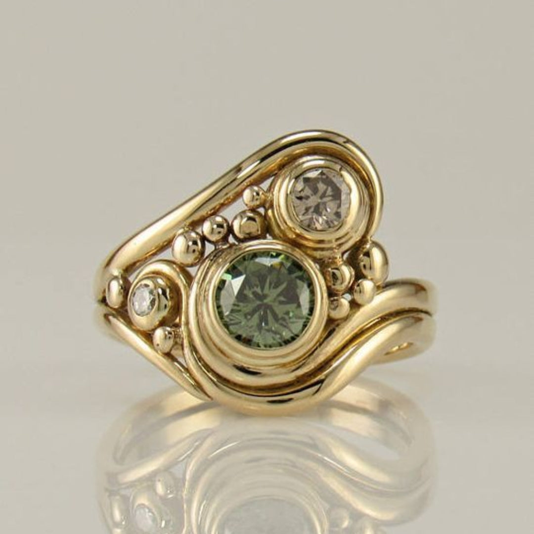 Bague vintage Goldring avec zircon vert