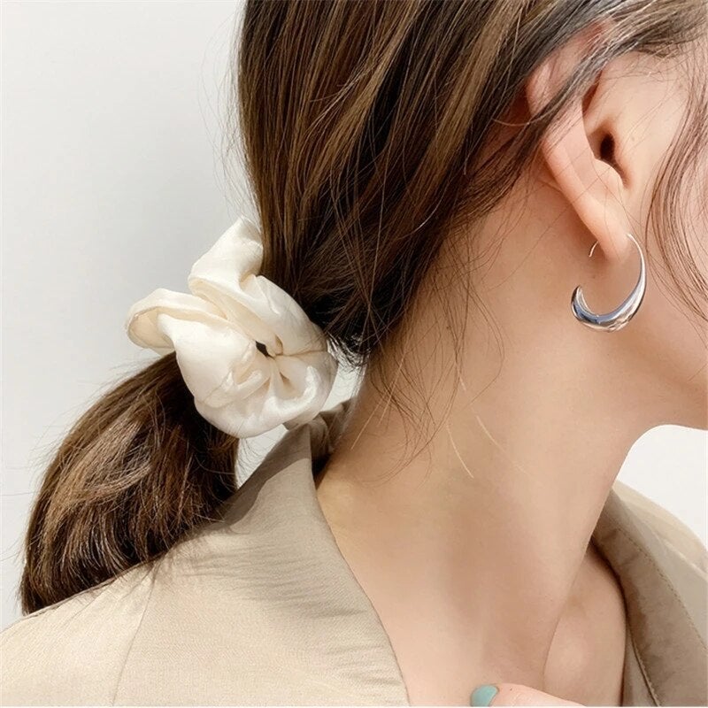 Boucles d'oreilles de luxe en or et en argent