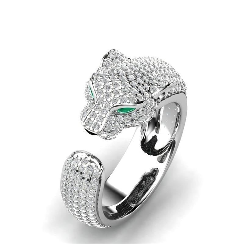 Bague réglable en argent et or rose 18 carats avec yeux en zircon vert